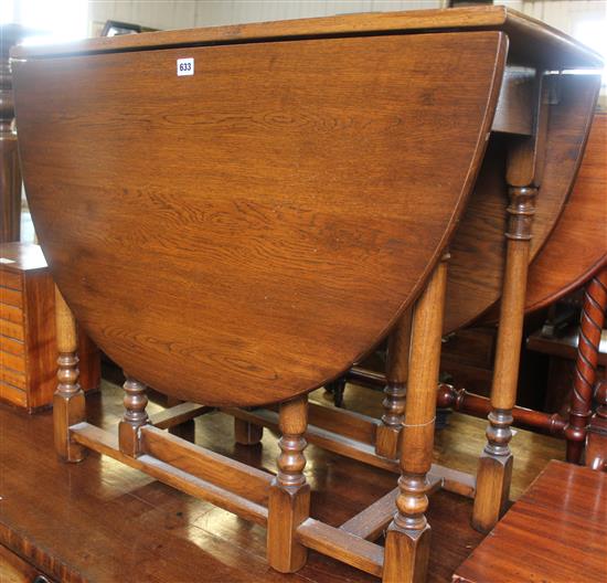 1920s oak oval topped gateleg dining table, 3ft